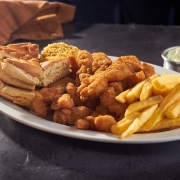 Porções: 88-Frango à Milanesa C/ Fritas - Porção (Ingredientes: Frango a Milanesa, Pãozinho e Farofa)