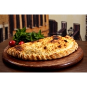 Calzones Salgados: Calzone Carne de Sol - Calzone (Ingredientes: Carne de Sol, Cebola, Molho, Mussarela, Tomate)