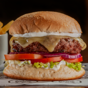 Hambúrguer: Prime Cheese Burguer ( Acompanha Fritas) - Hambúrguer (Ingredientes: Alface Americana, Cebola Roxa, hambúrguer bovino assado na brasa, Queijo, Tomate)