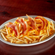 Porções: Batata Frita Prime - Porçâo Grande (Ingredientes: Batata Frita, Pedaços de Bacon, Queijo)