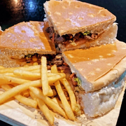 Lanches: Big X Palma Sola - Lanche (Ingredientes: Batata Palha, Maionese, Molho Especial da Casa, Ovo, Palmito, Picanha Acebolada, Presunto, Queijo, Tomate)