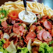Porções: Porção de Entrevero Marukas - Carne Bovina 180gr, Frango 180gr, Calabresa 180gr, Coração 180gr, Cebola 180gr, Fritas 400gr