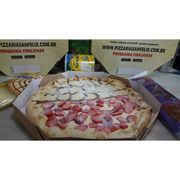 Doces: Ninho com avelã - Pizza Grande (Ingredientes: Chocolate avelã, Creme de leite em pó, Leite em pó NInho)