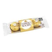 Chocolate: Ferrero Rocher - bombom coberto com chocolate ao leite e pedaços de avelã com recheio cremoso e avelã inteira