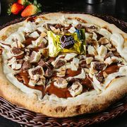 Doces: ouro branco - Pizza Grande (Ingredientes: bombom ouro branco, Creme de Chocolate, creme de ninho)