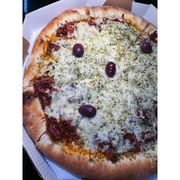 Tradicionais: CARNE SECA - Pizza (Ingredientes: Azeitonas, Carne seca refogada com azeite, alho e pimenta biquinho, Molho de tomate artesanal, Mussarela, Orégano)