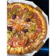 Tradicionais: LOMBINHO - Pizza (Ingredientes: Azeitonas, Lombo, Molho de tomate artesanal, Mussarela, Orégano, Parmesão, Tomate)