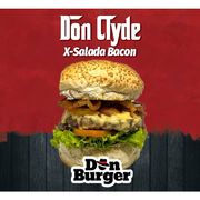 Lanches: Don Clyde (X Bacon-Salada) - Burger 140g (Ingredientes: Alface, Bacon, Burger Bovino, Cebola Roxa, Queijo Prato, Tomate)