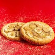 Esfihas Doces: Esfiha doce de Banana - Deliciosa esfiha doce contendo banana, mussarela, leite condensado, coco raldo e canela em pó.