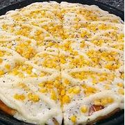 Tradicionais: Humita - Pizza Gigante (Ingredientes: Molho de Tomate, Mussarela, Milho, Catupiry, Orégano)