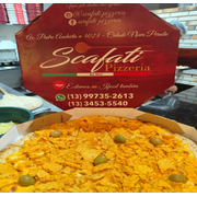 Tradicionais: Doritos - Pizza Grande (Ingredientes: Azeitona Verde, Cheddar, Doritos, Molho de Tomate, Mussarela, Orégano)