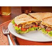 Beirute: Atum c/ Catupiry - Beirute (Ingredientes: Alface, Atum, Catupiry, Ovo, Pão Sírio, Tomate)