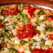 Tradicionais: Vegetariana - Pizza Grande (Ingredientes: Brócolis, Palmito, Tomate Seco, Champignon)