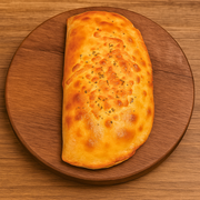 Promocionais: 01-Alho Granulado - Calzone (Ingredientes: Alho Granulado, Azeitona, Molho, Mussarela, Orégano, Tomate)