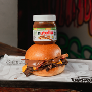 Burgers: Nutella Smash - Burger (Ingredientes: 2x Burger 80g (Smash), Queijo Cheddar (Fatiado), Bacon, Nutella)