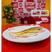 Stop Tapioca: Tapioca com Queijo, Ovo e Presunto+Embal. (R$1,50) - Stop Tapioca (Ingredientes: Goma de tapioca, Ovo, Presunto, Queijo)