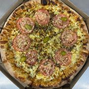 Tradicionais: Marguerita - Pizza Grande (Ingredientes: Mussarela, Parmesão, Manjericão Seco, Tomate)