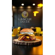Hambúrguer Artesanal: NANA BURGUER - Lanche (Ingredientes: 1 carne artesanal 150G, 1 fatia queijo cheddar, 2 tiras de bacon, BANANA FRITA, cream cheese, molho especial, Pao Brioche)