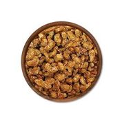 Castanhas: Castanha de caju caramelizada c/ gergelim 50g - A castanha de caju caramelizada é super crocante e saborosa. Além de ser um produto natural, é rico em fibras