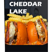 Hambúrguer: CHEDDAR LAKE - Lanche (Ingredientes: Bacon, BATATA CRINKLE, CEBOLA CARAMELIZADA, Cheddar, hamburguer artesanal 170g, PÃO BRIOCHE, Queijo)