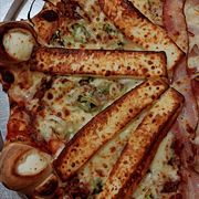 Premium: Costela com Queijo Coalho - Pizza Grande (Ingredientes: Alho Poró, Costela, Mussarela, Queijo Coalho)