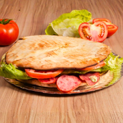 Beirute: Calabresa - Beirute (Ingredientes: Alface, Calabresa, Cebola, Molho da Casa, Molho Verde, Presunto, Tomate)