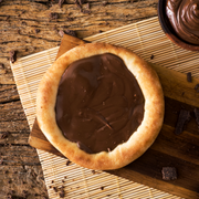 Esfiha: Nutella - chocolate em uma combinação irresistível, com Nutella de verdade.