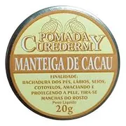 Pomadas: Pomada Curedermy Manteiga de cacau 20g - Rachaduras nos pés, lábios, seios, cotovelos, amaciando e protegendo a pele, tira-se manchas do rosto.Composição: Petrolato, Manteiga de Cacau e Óleo de Calêndula.
