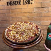 Especiais: Calabresa philadelphia - Pizza Broto (Ingredientes: Molho,  Calabresa, Mussarela, Cream Cheese)
