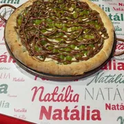 Doces: Eloisa - Pizza Grande (Ingredientes: Chocolate, Creme de Ninho, Uva Verde)