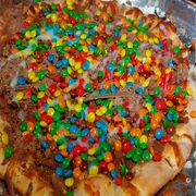 Doces: Confete - Pizza Gigante (Ingredientes: Chocolate Preto, Confete, Creme de Leite, Mussarela)