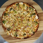 Tradicional: Vegetariana - Pizza Grande (Ingredientes: Molho de Tomate,  Mussarela,  Brócolis, Palmito,  Milho,  Azeitona,  Cebola Roxa, Alho Frito)