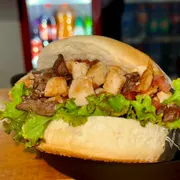 Lanches: X-Tudo - Lanches (Ingredientes: Alface, Ervilha, Maionese caseira, Milho, Presunto, Queijo, Tomate, Bacon, Calabresa, Coração, Frango, Hamburguer, Ovo)