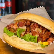 Lanches: X-Bacon - Lanches (Ingredientes: Alface, Ervilha, Maionese caseira, Milho, Presunto, Queijo, Tomate, Bacon, Hamburguer)