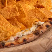 Tradicionais: DORITOS - Pizza Grande (Ingredientes: Catupiry, Cheddar, DORITOS, Molho de Tomate, Orégano)