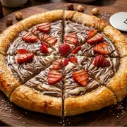 Edicao Limitada Mes das Mulheres: Broto Nutella com ninho eMorango - Broto de 4 fatias de creme de avelã com creme de leite ninho emorangos selecionados (fina camada de mussarela na base)
