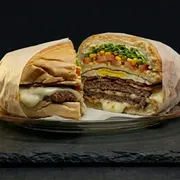 Lanches: X-Americano - Lanches Simples (Ingredientes: Pão de Hambúrguer, Maionese, Milho, Ervilha, Alface, Tomate, 2x Hambúrguer, Bacon, Ovo, Presunto, Queijo)