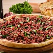 Tradicionais: carne seca - Pizza Gigante (Ingredientes: Carne Seca, Cebola, Molho, Mussarela, Orégano)