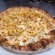 Tradicionais: 09.Mussarela - Pizza Grande (Ingredientes: Molho Artesanal, Mussarela, Orégano)
