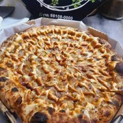 Doces: 61.Banana Nevada - Pizza Grande (Ingredientes: Banana, Canela, Chocolate Branco, Creme de Leite)