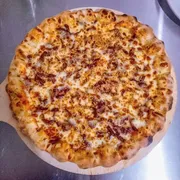 Tradicionais: 55.Filé ao Alho - Pizza Grande (Ingredientes: Alho Frito, Catupiry, Filé Mignon, Molho Artesanal, Mussarela, Orégano)