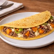 Crepiocas: Crepioca de Carne Moida com Abóbora - Seven + Fit (Ingredientes: Carne Moída, Abóbora, Alho Poró, Ricota)