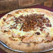 Tradicionais: 65- Peito de Peru - Pizza Grande (Ingredientes: Peito de Peru, Palmito, Bacon, Mussarela)