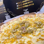 Tradicionais: 50- Milho - Pizza Grande (Ingredientes: Mussarela, Milho)