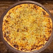 Sabores Tradicionais: Frango Ao Barbecue - Pizza Gigante (Ingredientes: Frango Desfiado, Milho, Molho Barbecue, Molho de Tomate, Mussarela, Orégano)