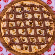 Doces: Banana Achocolatada - Pizza Média (Ingredientes: Banana, Canela, Chocolate, Mussarela)