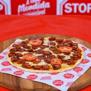 Pizza Brotão: Calabresa - Pizza Brotão (Ingredientes: Calabresa, Molho, Orégano, Queijo, Tomate)