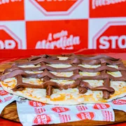 Pizza Brotão: Banana Achocolatada - Pizza Brotão (Ingredientes: Banana, Canela, Chocolate, Mussarela)