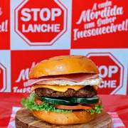 Sanduiches Artesanais: Stopsalada Artesanal - Sanduiches Artesanais (Ingredientes: Hamburguer Caseiro 130g, molho artesanal, ovo, pão brioche, Presunto, Queijo Cheddar, verduras)