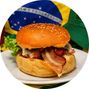 Sanduíches: X-Bacon - Hambúrguer (Ingredientes: Alface, Bacon, Carne, Pão, presunto de peru, Queijo, Tomate)